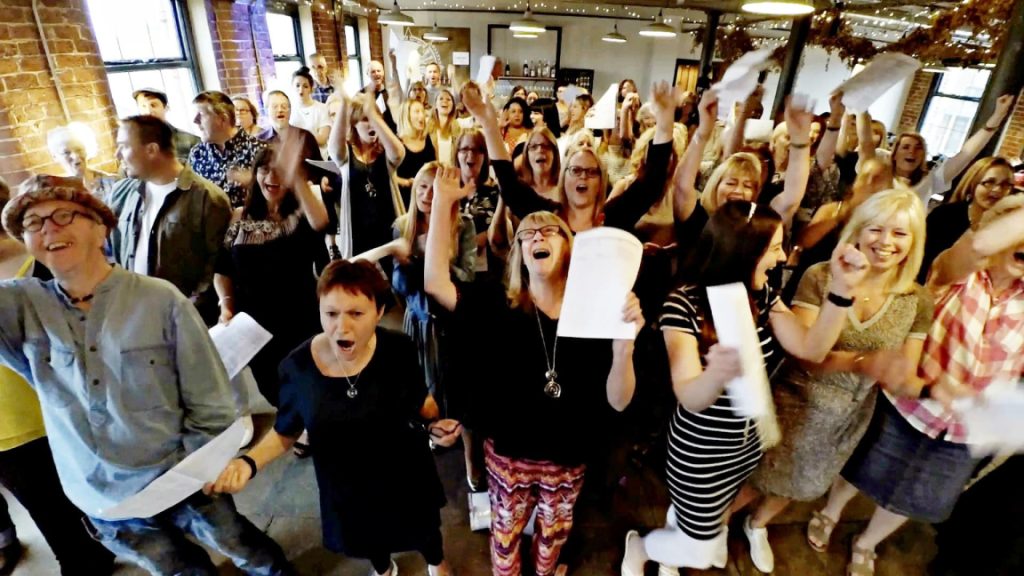 So Choir! session in a bar in Leeds with everyone cheering