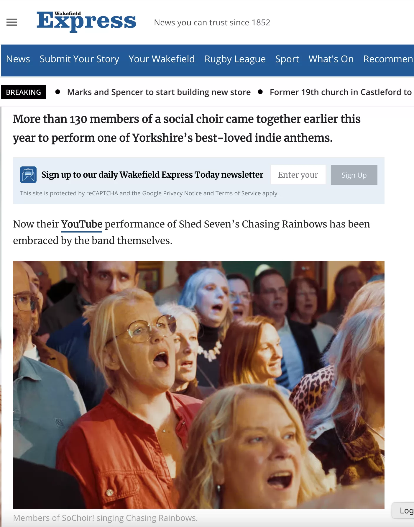 Screenshot of Wakefield Express article about So Choir!'s 130-voice Chasing Rainbows performance, featuring singers at Selby Town Hall
